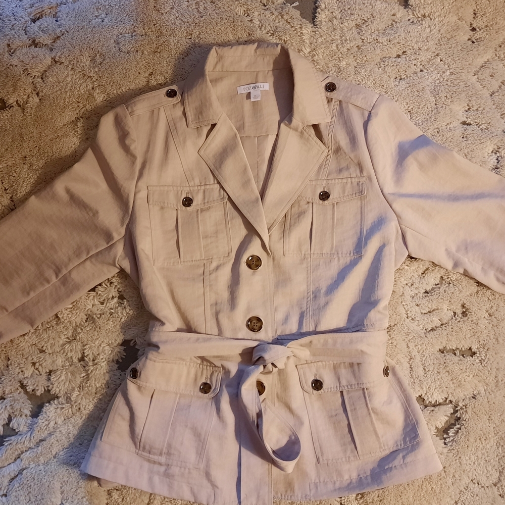 A beautiful tan raincoat.